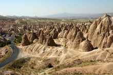 Chimneys and cyclists in Cappadocia